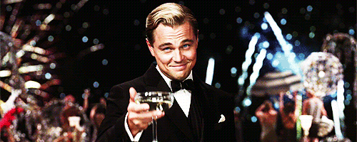 Dicaprio toasting with firework in the background